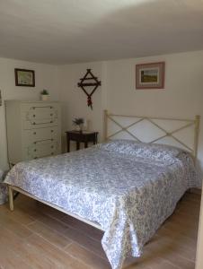 Postel nebo postele na pokoji v ubytování Appartamento Gnomo Leo + 28 fotografií