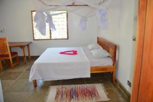 Postel nebo postele na pokoji v ubytování Villa Nika, between palm trees, beach and elephants + 25 fotografií