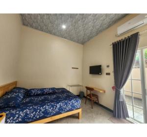 TV a/nebo společenská místnost v ubytování OYO 94924 Cidu Homestay Syariah