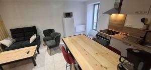 Kuchyň nebo kuchyňský kout v ubytování Le 4 - Coeur de ville