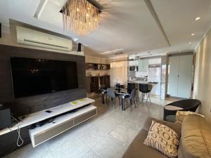 Et tv og/eller underholdning på COP 30 aconchego e conforto