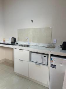 Kuchyň nebo kuchyňský kout v ubytování Apartamento em Sinop 8M