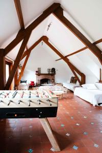 Una cama o camas en una habitación de Le Paddock by Ernesst 36 fotos más