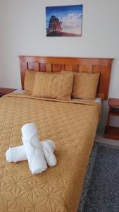 Postel nebo postele na pokoji v ubytování AG3K Oasis