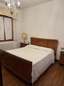 Postel nebo postele na pokoji v ubytování Appartamento Vacanza Paris e Carolina