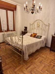 Postel nebo postele na pokoji v ubytování Appartamento Vacanza Paris e Carolina