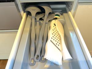a group of utensils are hanging in a refrigerator at OKINAWA POOLWILLA ONNA 4A - Vacation STAY 48422v in Baba