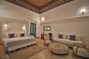 Postel nebo postele na pokoji v ubytování Riad 5 GÉNÉRATIONS