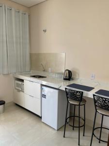 Kuchyň nebo kuchyňský kout v ubytování Apartamento em Sinop 11 + 2 fotografie