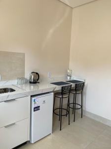 Kuchyň nebo kuchyňský kout v ubytování Apartamento em Sinop 11