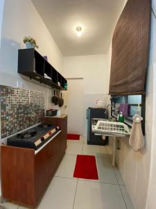 Kuchyň nebo kuchyňský kout v ubytování Cybercity 1 Bedroom by SCI Homestay