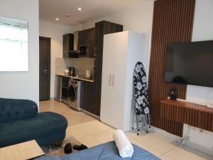 Kuchyň nebo kuchyňský kout v ubytování Luxe Corner Apartments