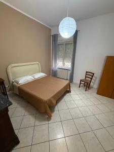 Postel nebo postele na pokoji v ubytování Gli ultimi romantici