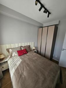 Postel nebo postele na pokoji v ubytování Apartamento 5km de Alphaville com estacionamento + 26 fotografií