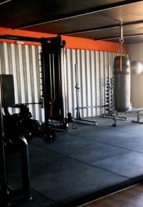 a room with a gym with a punching at Apartamento Vista Mar atalaia varanda gourmet in Aracaju