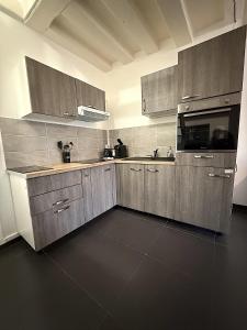 Η κουζίνα ή μικρή κουζίνα στο Cœur de Ville - familial - Parking gratuit - WIFI