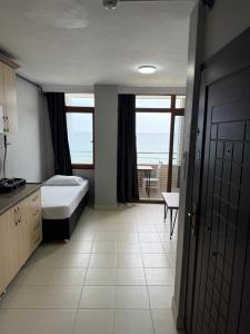 Ένα ή περισσότερα κρεβάτια σε δωμάτιο στο Rumeli Pansiyon +2 φωτογραφίες