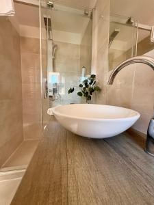 Koupelna v ubytování Trio Apartments