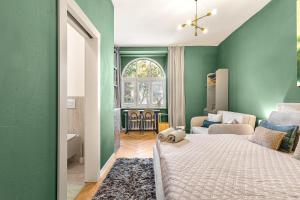 Postel nebo postele na pokoji v ubytování APARTMAN OLLIES se snídaní zdarma + 19 fotografií