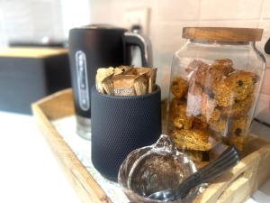 a table with a tray of food and a jar of food at 20 At Jeanette in Ludwigsdorf
