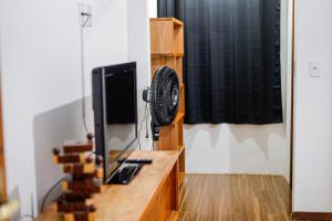 Μια τηλεόραση ή/και κέντρο ψυχαγωγίας στο Casa Manacah - casa em Tiradentes