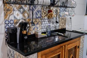 Η κουζίνα ή μικρή κουζίνα στο Casa Manacah - casa em Tiradentes