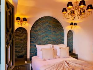 Postel nebo postele na pokoji v ubytování Riad Kaya + 30 fotografií