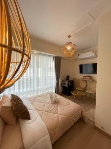 Postel nebo postele na pokoji v ubytování Mari Home