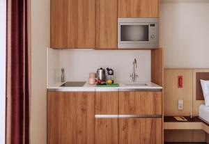 Køkken eller tekøkken på Numa Madrid Fuencarral