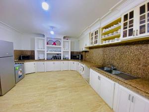 Kuchyň nebo kuchyňský kout v ubytování Villa Moyen orient by séjour