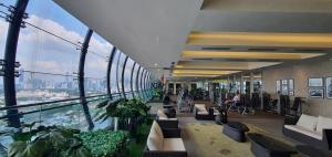 an office building with a view of the city at M City in Kuala Lumpur