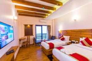 Postel nebo postele na pokoji v ubytování Holesung Resort