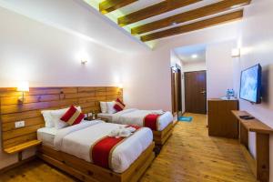 Postel nebo postele na pokoji v ubytování Holesung Resort