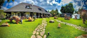 En have udenfor Pensiunea AGI TRADIȚIONAL 5- MARGARETE