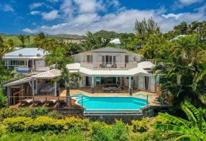 an aerial view of a house with a swimming pool at Villa spa Grand Anse in Petite Île +31 photos