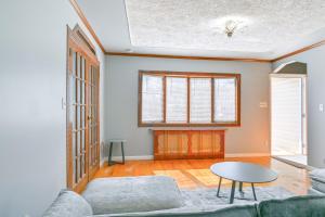 a living room with a couch and a table at Choice home in West Babylon