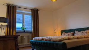 Postel nebo postele na pokoji v ubytování Herzstück