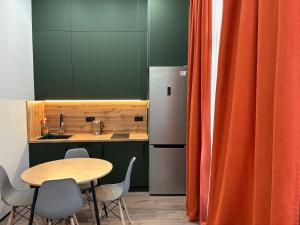 Η κουζίνα ή μικρή κουζίνα στο Квартира Арена Таурес