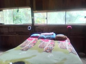 Voodi või voodid majutusasutuse Sítio do guerreiro toas