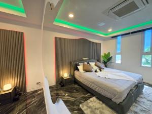 Postel nebo postele na pokoji v ubytování Musselana Beachfront Luxury Suite + 36 fotografií