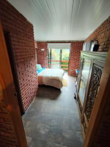 Postel nebo postele na pokoji v ubytování Vinoteca cerro