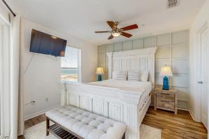 En eller flere senge i et værelse på Gulf Island Condo 431 + 20 billeder