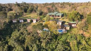an aerial view of a house on a hill at Tupa Lodge in Puerto Iguazú