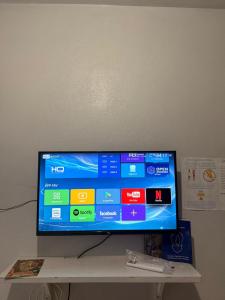 TV a/nebo společenská místnost v ubytování Pousada São José