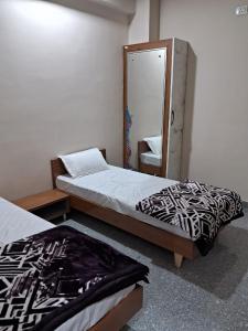 Postel nebo postele na pokoji v ubytování JD Bro Inn Hotel + 4 fotografie