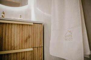 Majutusasutuses WhiteWood Noszvaj olev sertifikaat, autasu, silt või muu dokument