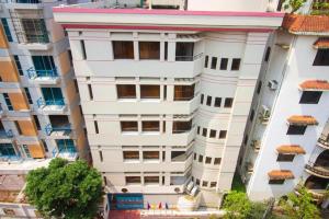 an overhead view of a white building at Suite Palace in Dhaka