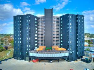 an aerial view of a building with two tall buildings at Boho, Walk East Village, Downtown, Free Parking in Des Moines