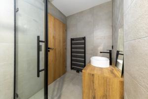 Ένα μπάνιο στο Rattendorf Luxury Apartments