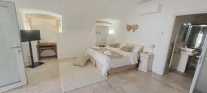 Postel nebo postele na pokoji v ubytování B&B La Loggia